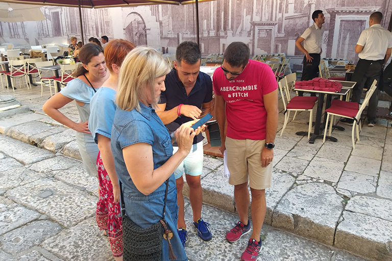 Employees completing GPS missions using tablet devices